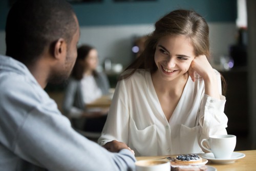 Is She Flirting With Me or Being Friendly? 10 Signs She's Flirting!